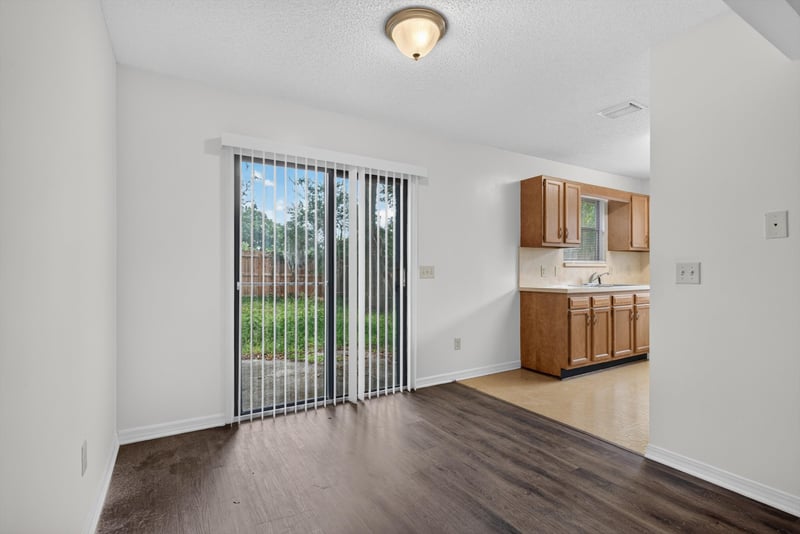 Hallway with sliding door view at 1445 Classic Oak Rd W, Jacksonville, FL