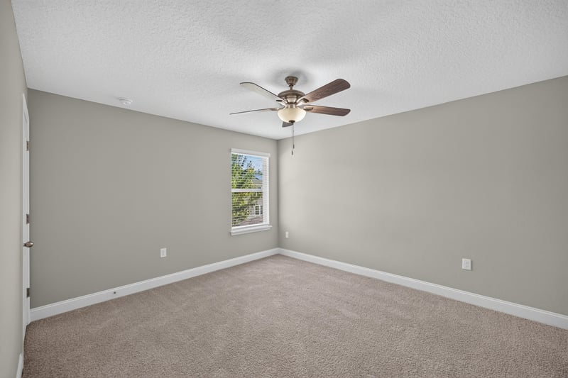 Bedroom with carpet and window at 331 Millerstone Dr, St. Augustine, FL 32092