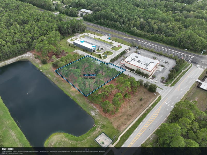 Aerial view of the parcel boundary beside the pond and parking lot at 4900 US-1, St. Augustine, FL 32086