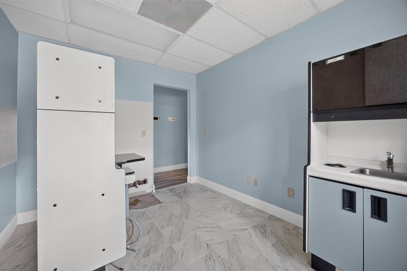 Kitchenette with cabinets and counter space at 1543 Kingsley Ave #19, Orange Park, FL 32073
