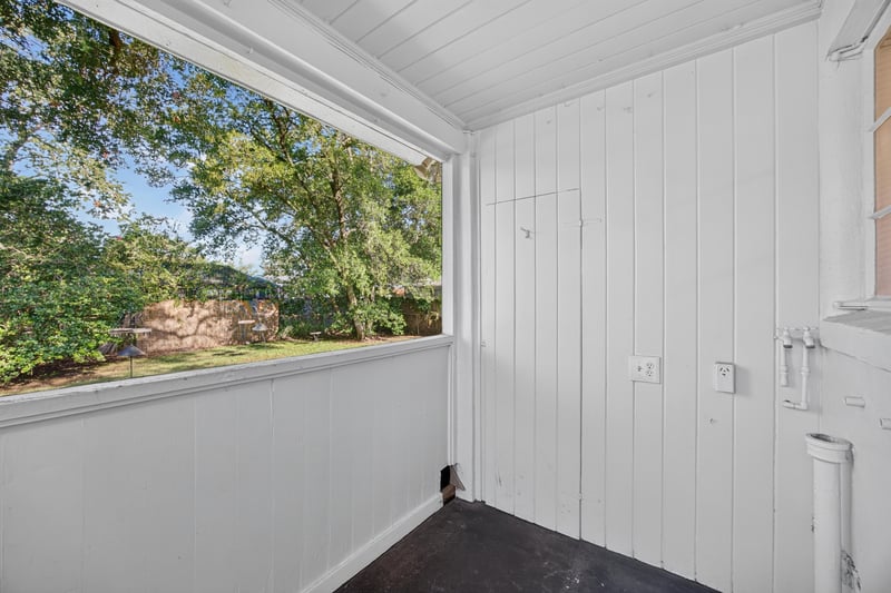 Sunroom with windows and wood ceiling at 6338 Mercer Cir W, Jacksonville, FL