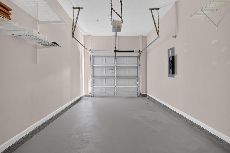 Attached garage with overhead door at 7047 Deer Lodge Cir, Jacksonville