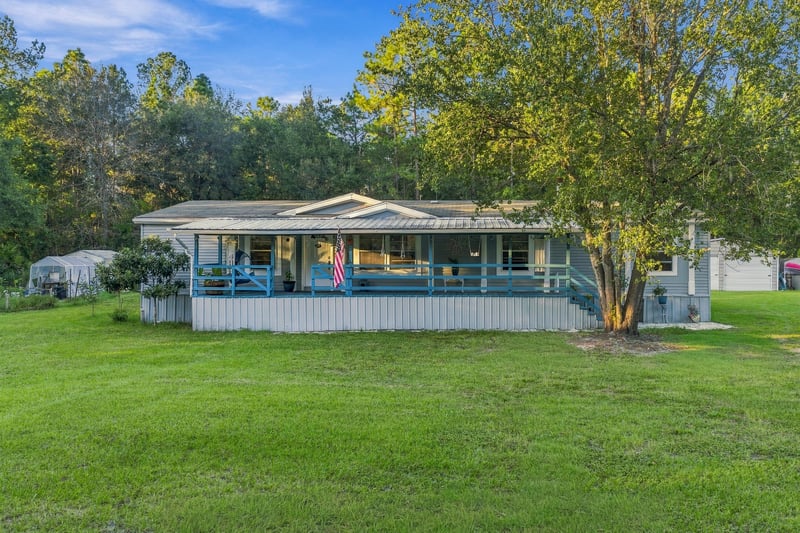 Front exterior in daylight, photographed by Megapixeler on Secret Cove Rd, Middleburg, FL