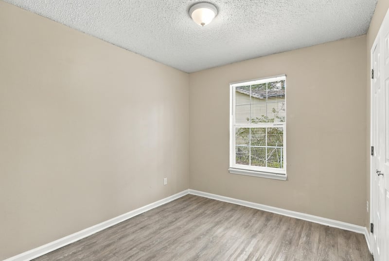 Empty bedroom corner with window at 219 Shortreed St, Jacksonville, FL 32254