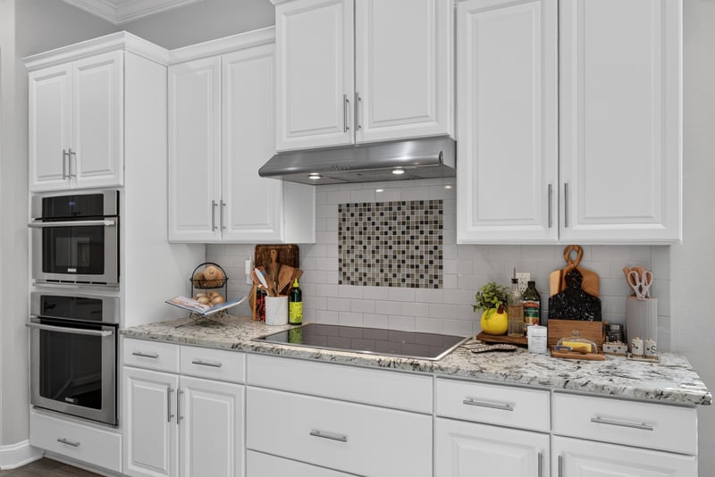 Kitchen double oven and tile backsplash at 3328 Southern Oaks Dr, Green Cove Springs, FL 32043