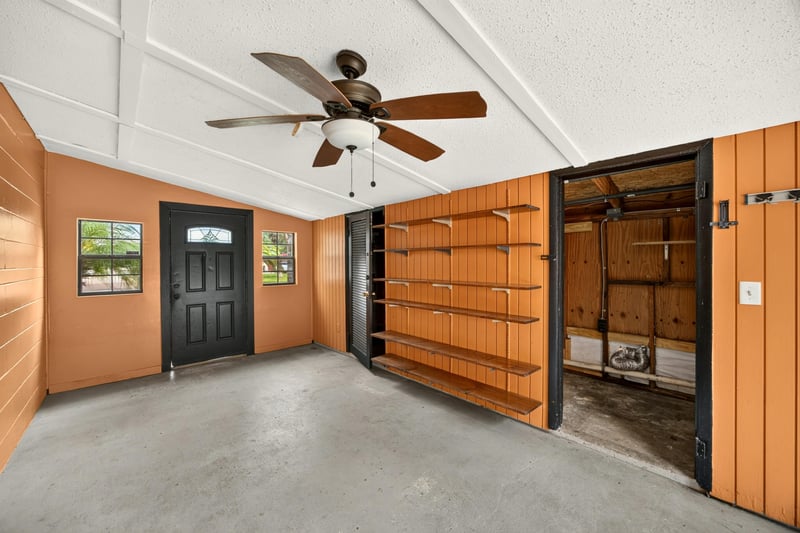 Garage or storage room with wood shelving at 4039 Habana Ave, Jacksonville, FL