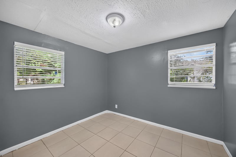 Bedroom staged view toward windows at 6745 Jack Horner Ln, Jacksonville, FL 32210