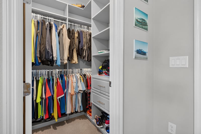 Closet with built-in shelving at 22 Azura Point