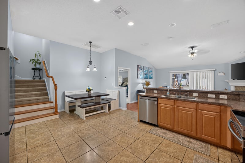 Kitchen counter with view of staircase at 3112 Silverado Cir, Green Cove Springs, FL 32043