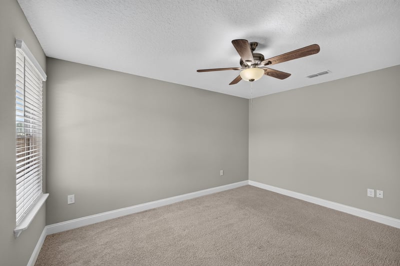 Bedroom corner with carpet at 331 Millerstone Dr, St. Augustine, FL 32092