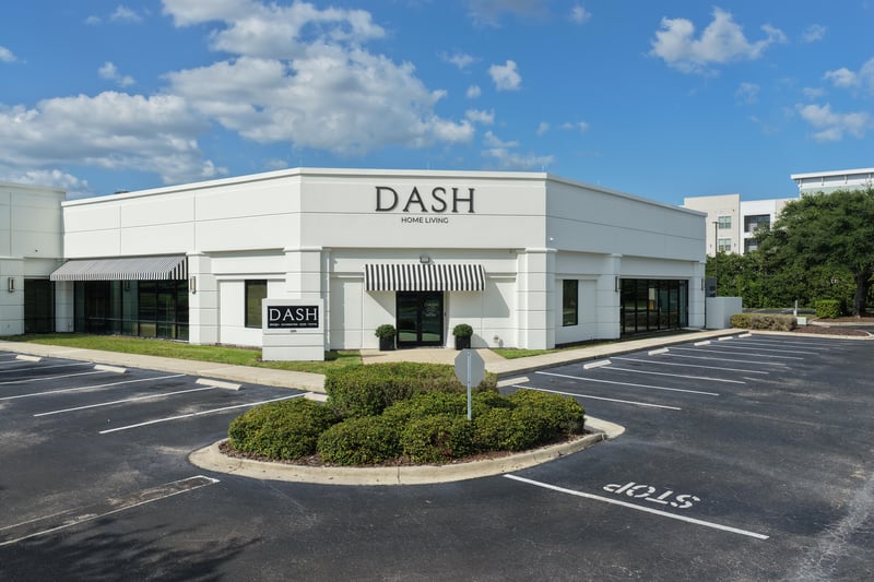 DASH storefront entrance with awning sign at 10550 Deerwood Park Blvd, Jacksonville, FL 32256