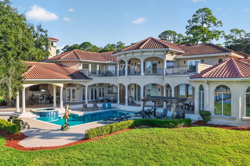 Rear exterior wide view of the pool and home at 344 Broward Rd, Jacksonville, FL