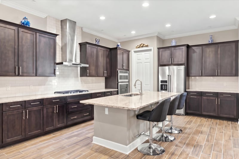 Kitchen island with bar seating, photographed by Megapixeler on Lucena Ln, Jacksonville, FL