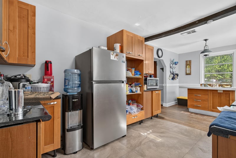 Kitchen with refrigerator and water cooler at 5745 110th St, Jacksonville, FL 32244