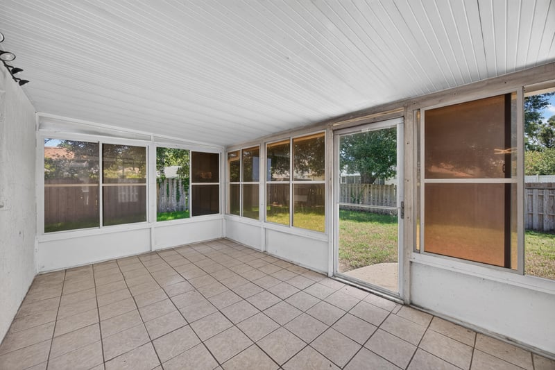 Screened porch with windows at 3428 Glenn Hollow Ct, Jacksonville, FL 32226