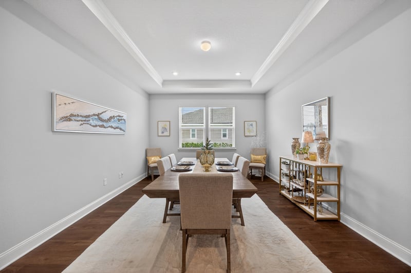 Dining area with wood table and wood flooring at 85491 Fall River Pkwy, Fernandina Beach, FL 32034