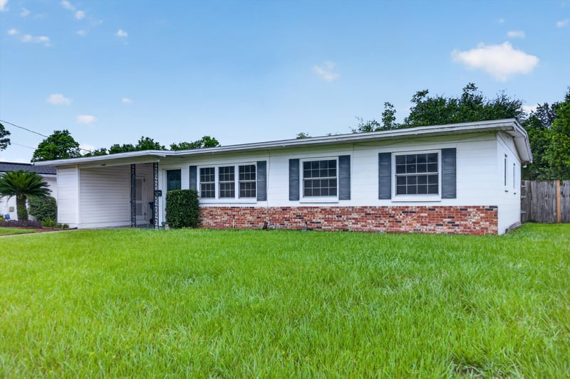 Front exterior view of brick ranch home at 11462 Elane Dr, Jacksonville, FL