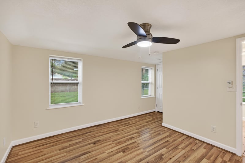 Empty room with wood floors and natural light at 1619 Hammond Blvd, Jacksonville, FL