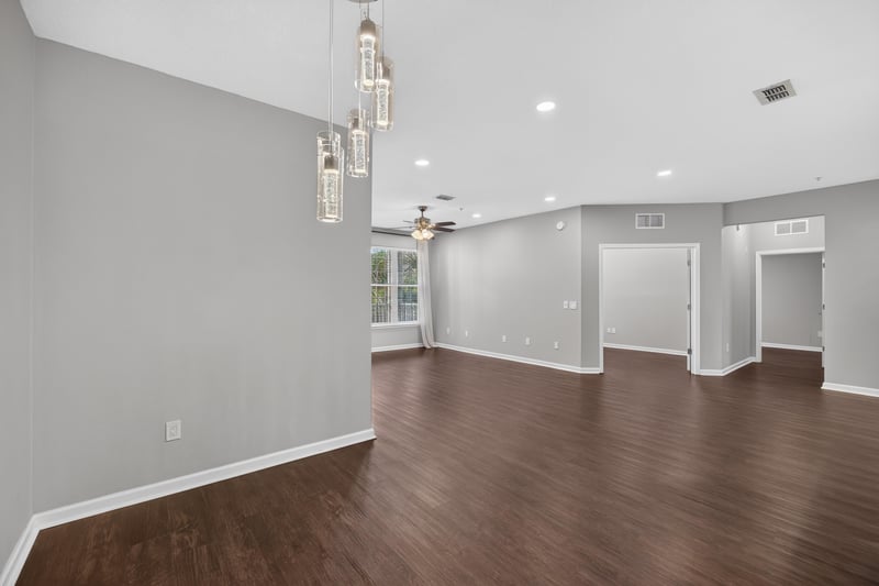 Open living area with wood floors at 11251 Campfield Dr unit 4209, Jacksonville, FL 32256