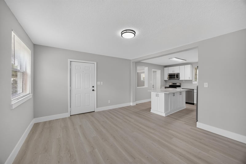 Living space opening to the kitchen at 6238 Randia Dr, Jacksonville, FL 32210