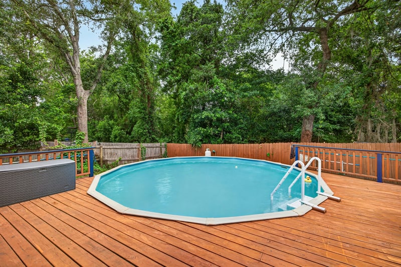 Above ground pool on wood deck at 981 Marble Ridge Dr, Orange Park, FL 32065