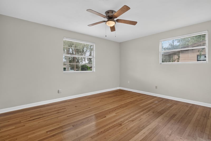 Bedroom with wood floors and ceiling fan at 217 Baisden Rd, Jacksonville, FL 32218