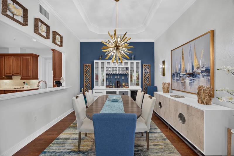 Dining area open to the kitchen with pendant lighting at 140 Ave De La Mer, Palm Coast, FL 32137