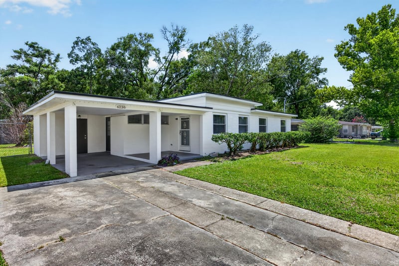 Carport and driveway from the front at 6238 Randia Dr, Jacksonville, FL 32210