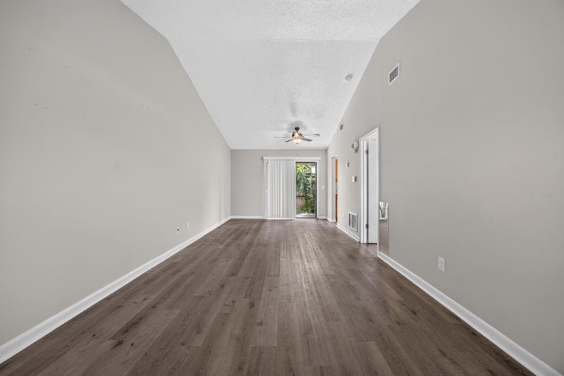 Living room view toward hallway and doors at 2719 Trollie Ln