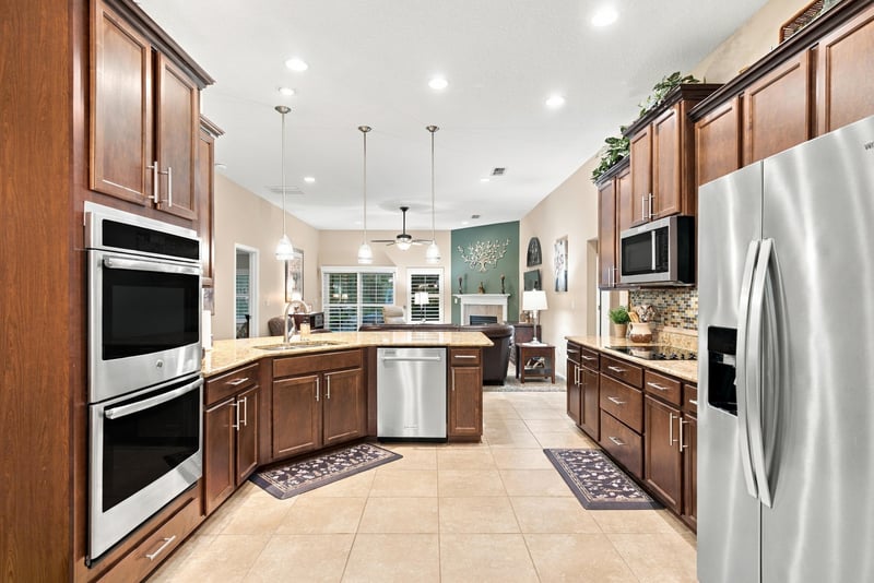Kitchen with stainless appliances and tile floor at 10923 Black Diamond Ct, Jacksonville, FL