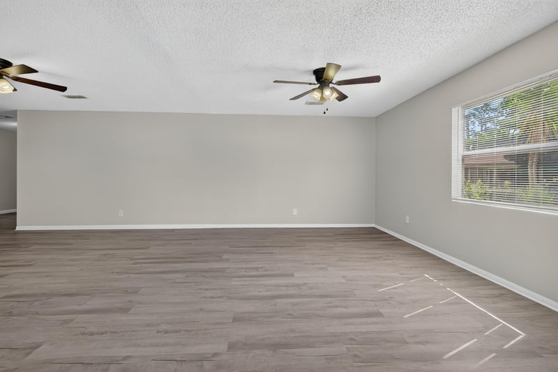 Room with window and wood-look floor at 5503 Boeing Dr, Jacksonville, FL 32207
