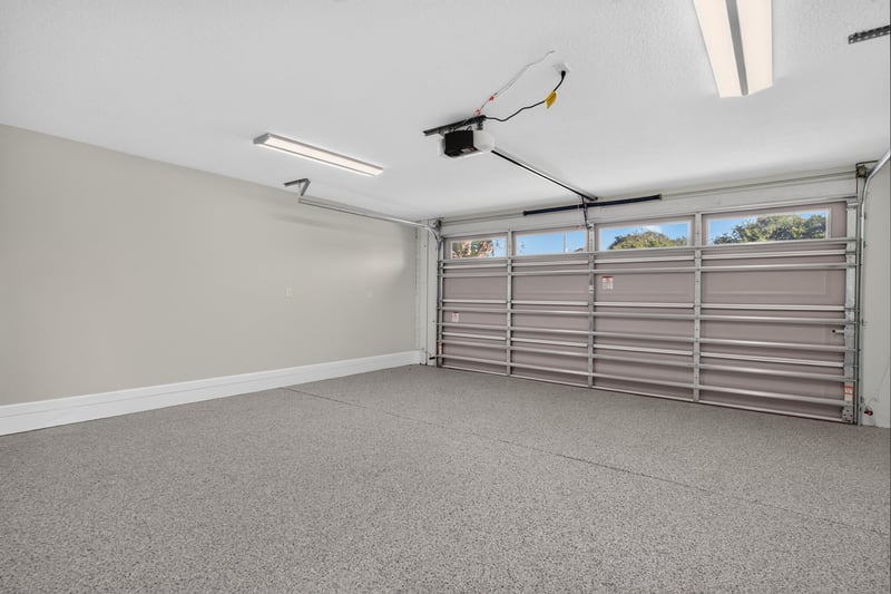 Garage interior with epoxy floor at 1525 8th St N, Jacksonville Beach, FL