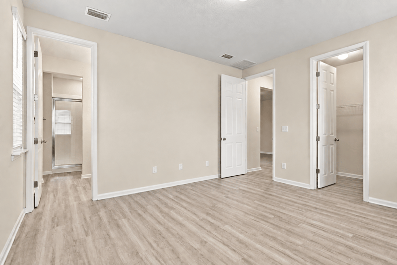 Hallway leading to secondary bedrooms at 7088 Mahogany Run Dr, Jacksonville, FL 32244