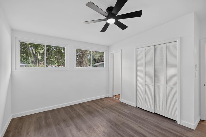 Bedroom with ceiling fan and closet at 3113 Kline Rd, Jacksonville, FL 32246