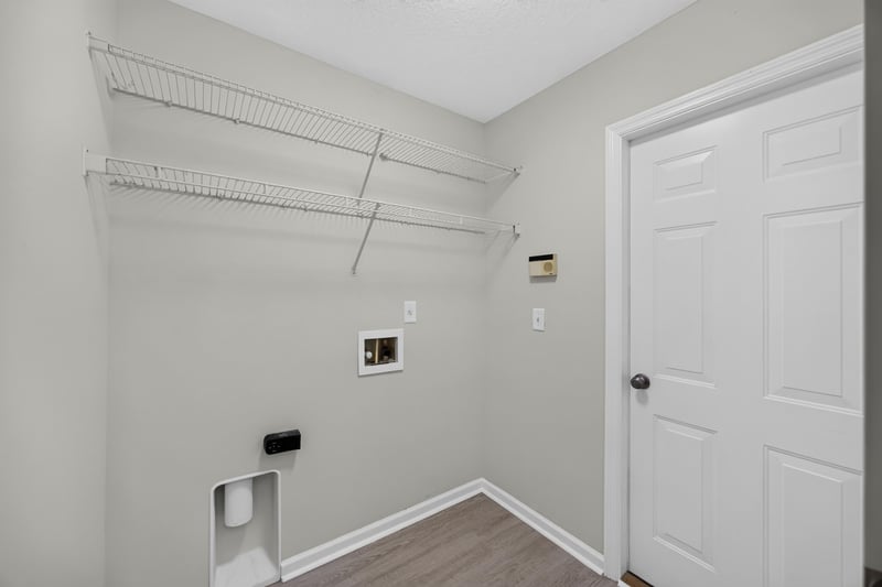 Laundry room with shelving at 706 Bonaparte Dr, Jacksonville, FL 32218