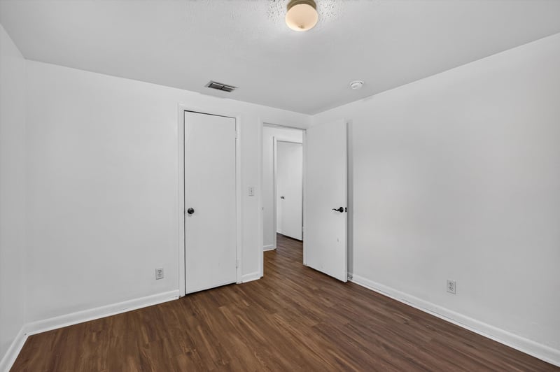 Empty room with closet doors at 5812 Tampico Rd, Jacksonville, FL 32244