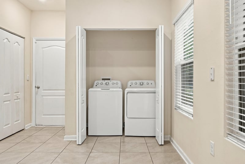 Laundry closet with washer and dryer at 9555 Star Dr, Jacksonville, FL 32256