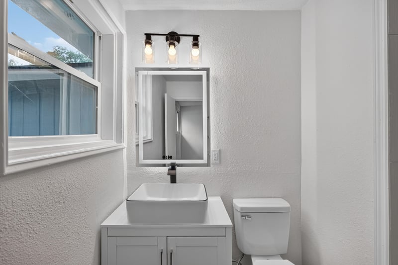 Bathroom with vanity and mirror at 3113 Kline Rd, Jacksonville, FL 32246