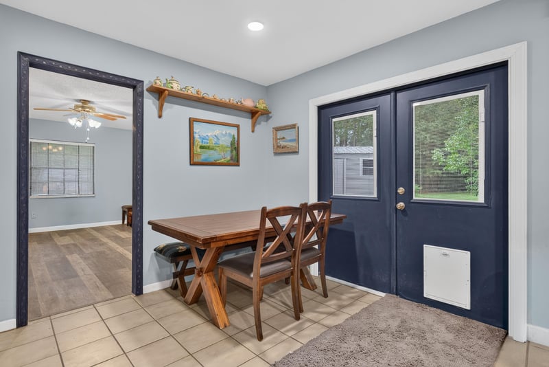 Dining area with double doors leading outside at 3249 Maryland Ave, Green Cove Springs, FL
