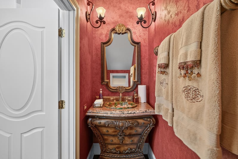 Powder room with red accent walls at 344 Broward Rd, Jacksonville, FL