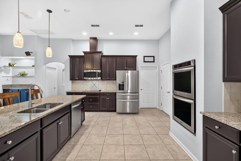 Kitchen with stainless appliances and granite counters at 538 Porta Rosa Circle, St. Augustine, FL 32092