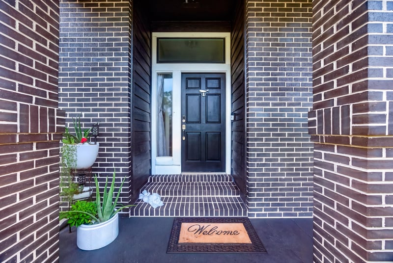 Front entry door with brick surround at 1346 Gately Ct, Jacksonville, FL 32225