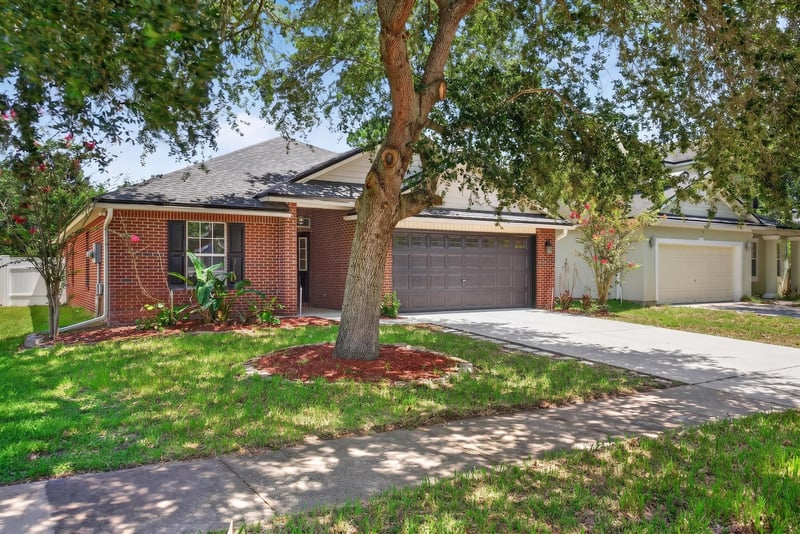 Front exterior view from across the street at 224 Pine Arbor Cir, St. Augustine, FL 32084