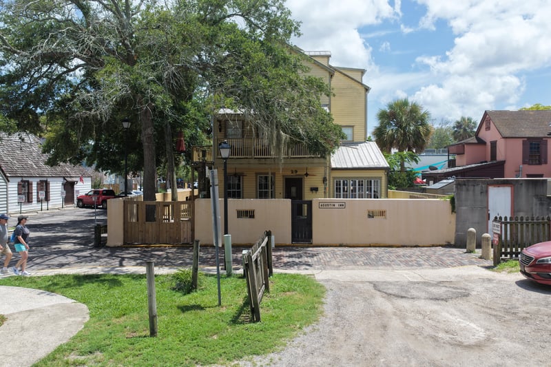 Side exterior with fenced walkway and landscaping at 29 Cuna St, St. Augustine, FL 32084