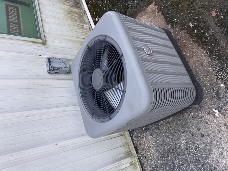 Condenser unit against vinyl siding at 11700 New Kings Rd, Jacksonville, FL 32219