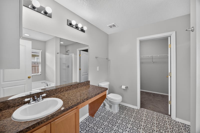 Bathroom vanity with tile flooring at 7545 Lirope St, Jacksonville, FL 32244