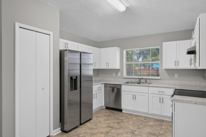 Kitchen with stainless range and tile floor at 1108 Hidden Cove Cir S, Atlantic Beach, FL 32233