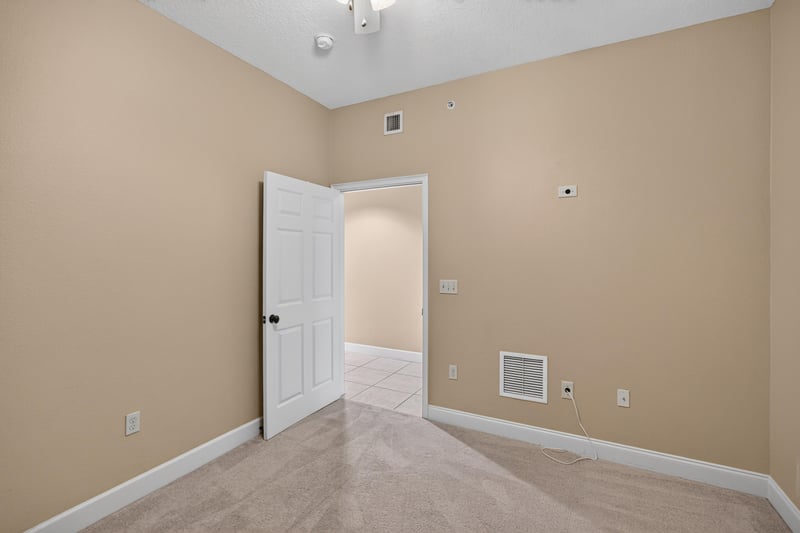 Bedroom with open door at 1478 Riverplace Blvd 1904, Jacksonville, FL 32207