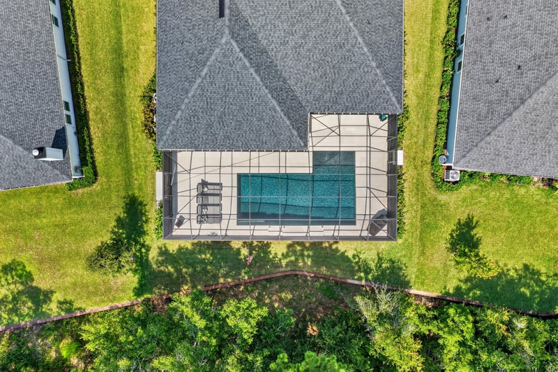 Aerial close-up of the pool and backyard at 785 Back Creek Dr, St. Augustine, FL 32092