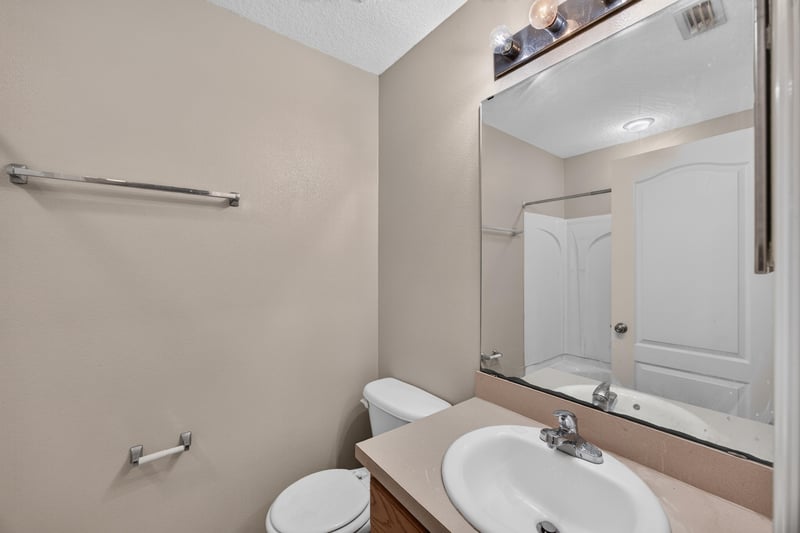 Bathroom with vanity, mirror and towel bar at 1572 Biscayne Bay Dr, Jacksonville, FL 32218